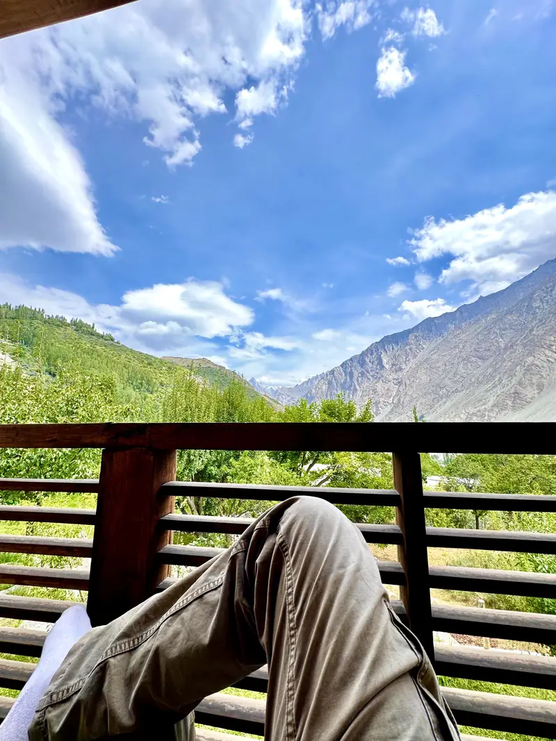 Feet up on the balcony with a mountain view